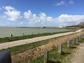 Uitzicht op een vollopende baai van de Somme tijde