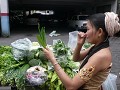 Mai Kaidee buying vegetables