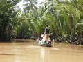 Roeibootje varen op de Mekongdelta