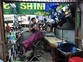 A haircut in a local barber shop before dinner.