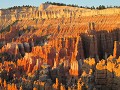 The golden glow of the sunrise makes Bryce Canyon 