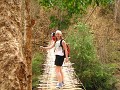 Emily crossing the bamboo bridge which was very sh