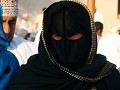 Verschleierte Omani Frau.