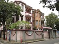 Guanzhou, Xinhepu wijk, koloniale huizen met Chine