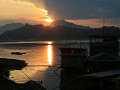 zonsondergang aan de Mekong rivier