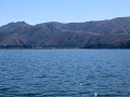 Laguna Paca - boottochtje, bergen in vorm van ligg