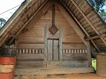 typisch Marron-huisje, met veel houtsnijwerk versi