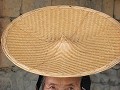 een MOSHA-dai met typische hoed
