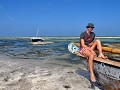 Beach-boy op 't strand van Jambiani