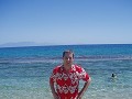 Standing by the sea in Mykonos.