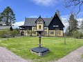 No-Zw-La25-02 -67-Mora, huis en tuin van de famili