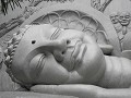 De dromende liggende marmeren boeddha
