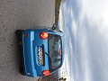 Onze flashy blauwe Chevrolet Spark