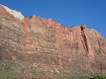 Zion National Park : Op dexe rots hangt een klimme