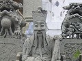 BANGKOK. WHAT ARUN. Een 'bewaker' in het complex v